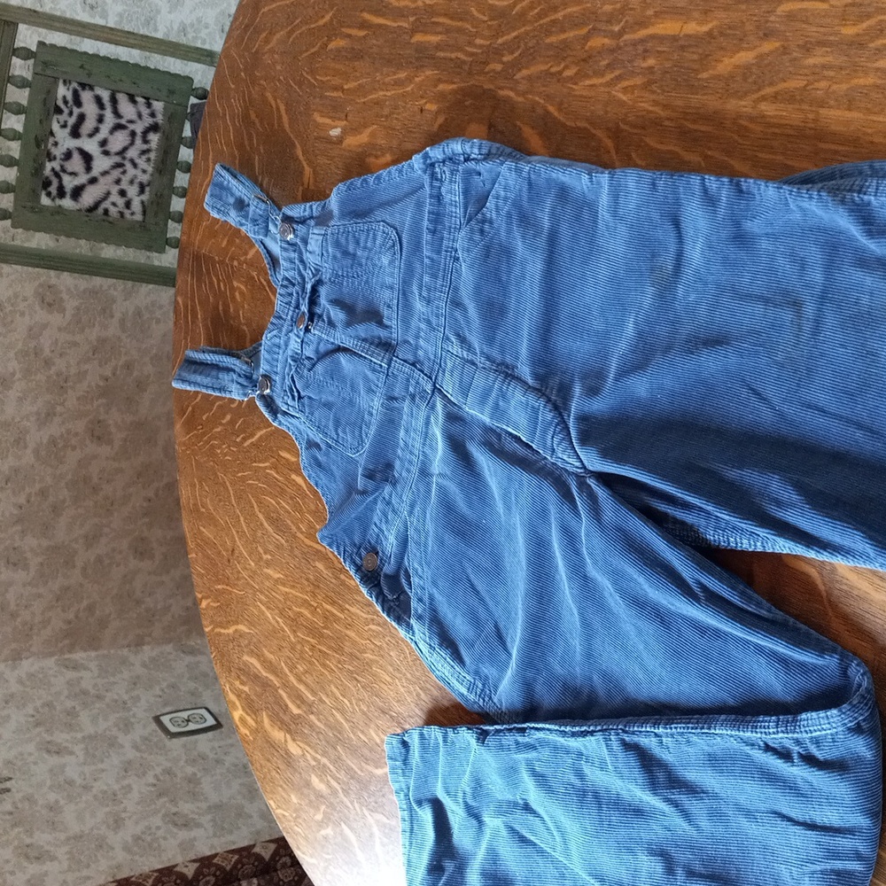 Distressed Vintage Gap corduroy overalls size small.